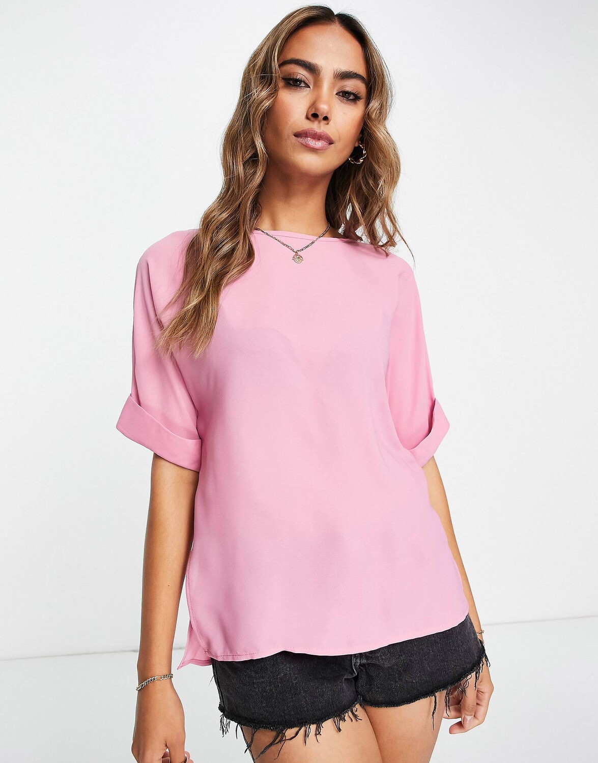 

Розовая футболка оверсайз с отворотами на рукавах ASOS DESIGN