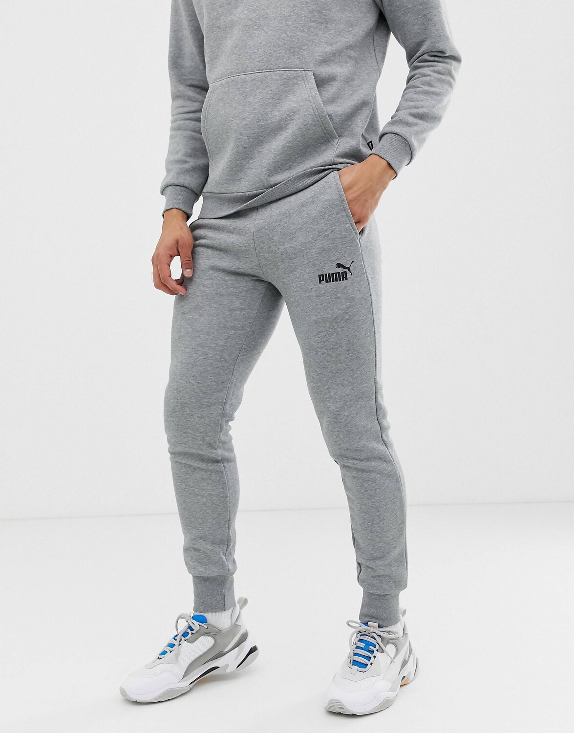 

Серые узкие джоггеры с маленьким логотипом Puma Essentials