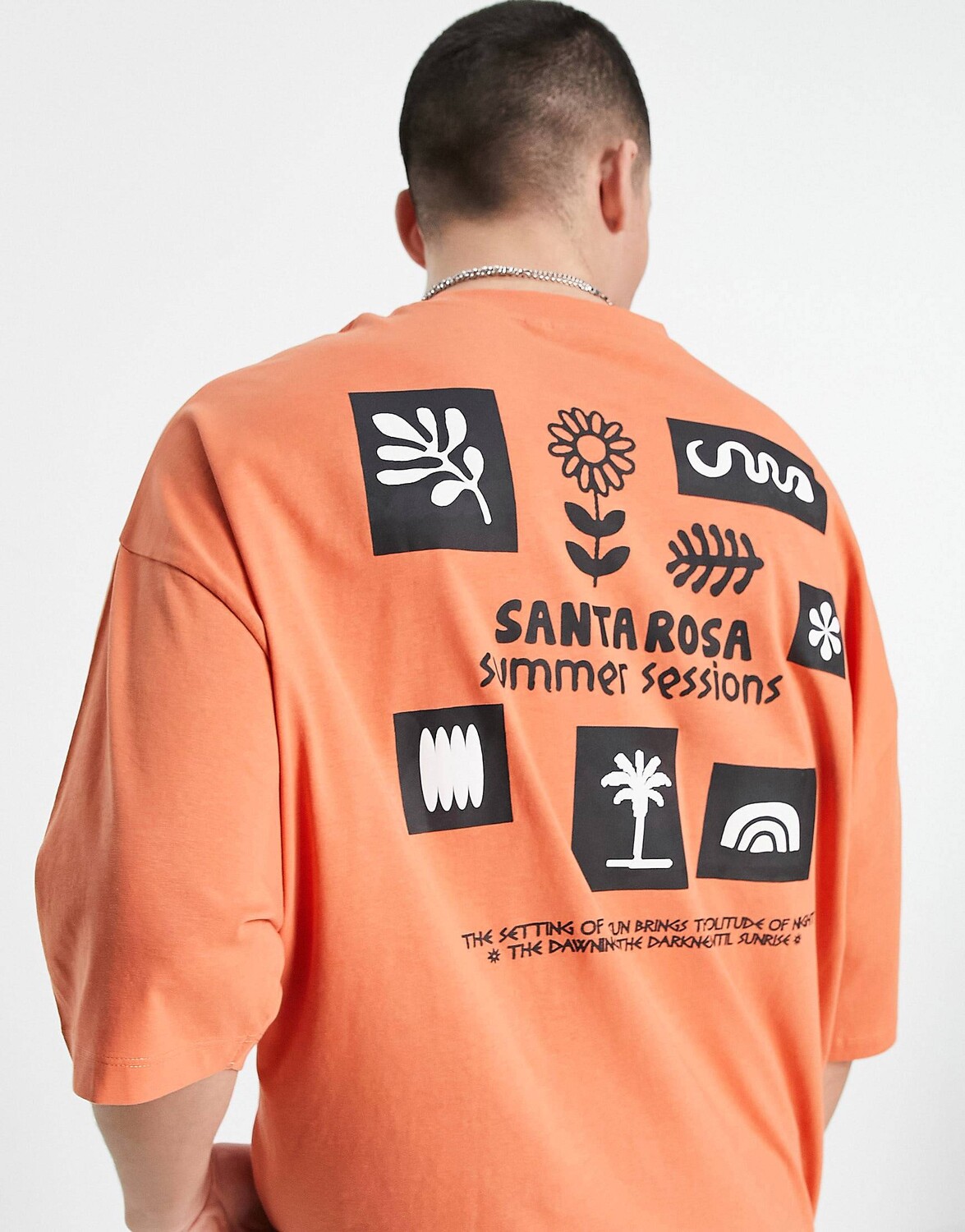 

Оранжевая футболка оверсайз с мультяшным принтом спереди и сзади ASOS DESIGN