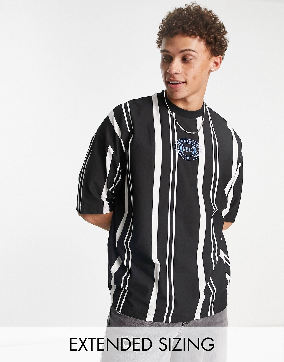 

Oversize-футболка в темную полоску с принтом NYC ASOS DESIGN