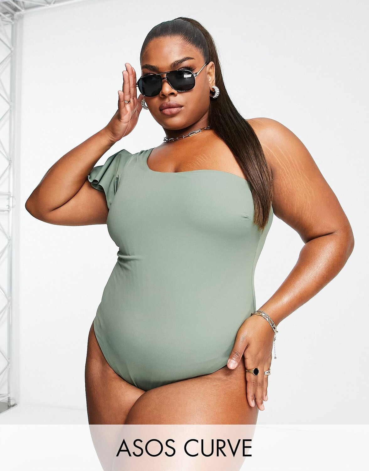 

Купальник цвета хаки на одно плечо с развевающимися рукавами ASOS DESIGN Curve