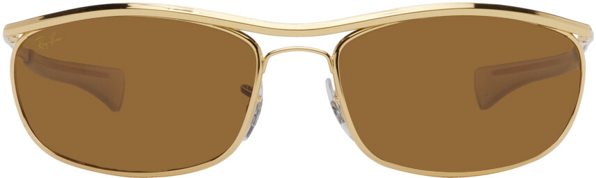 

Золотые солнцезащитные очки Olympian I Deluxe Ray-Ban