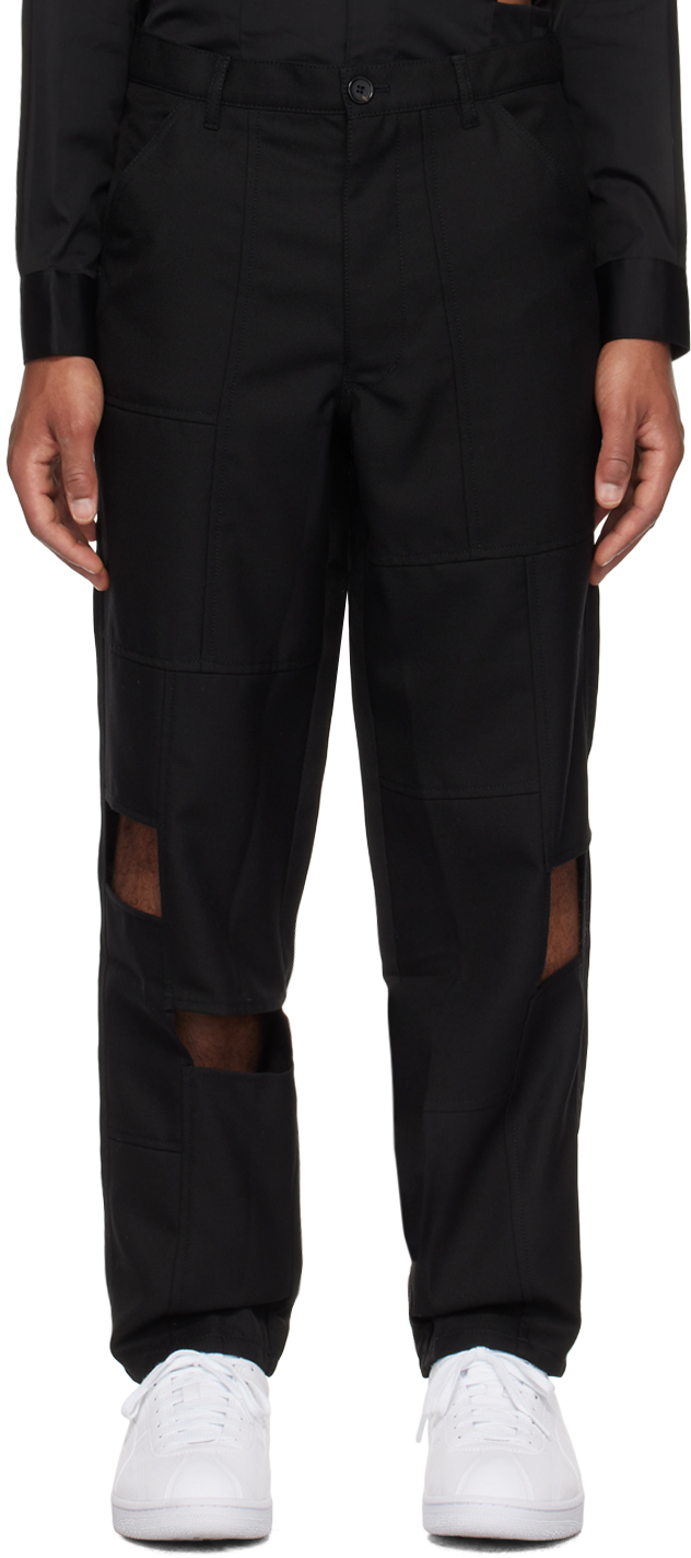цена Черные брюки с вырезом Comme des Garçons