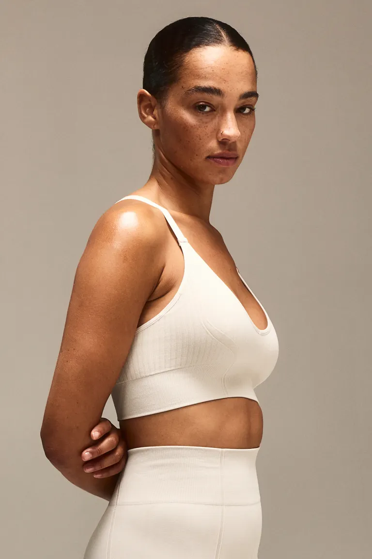 

Спортивный бюстгальтер medium support от drymove H&M, бежевый