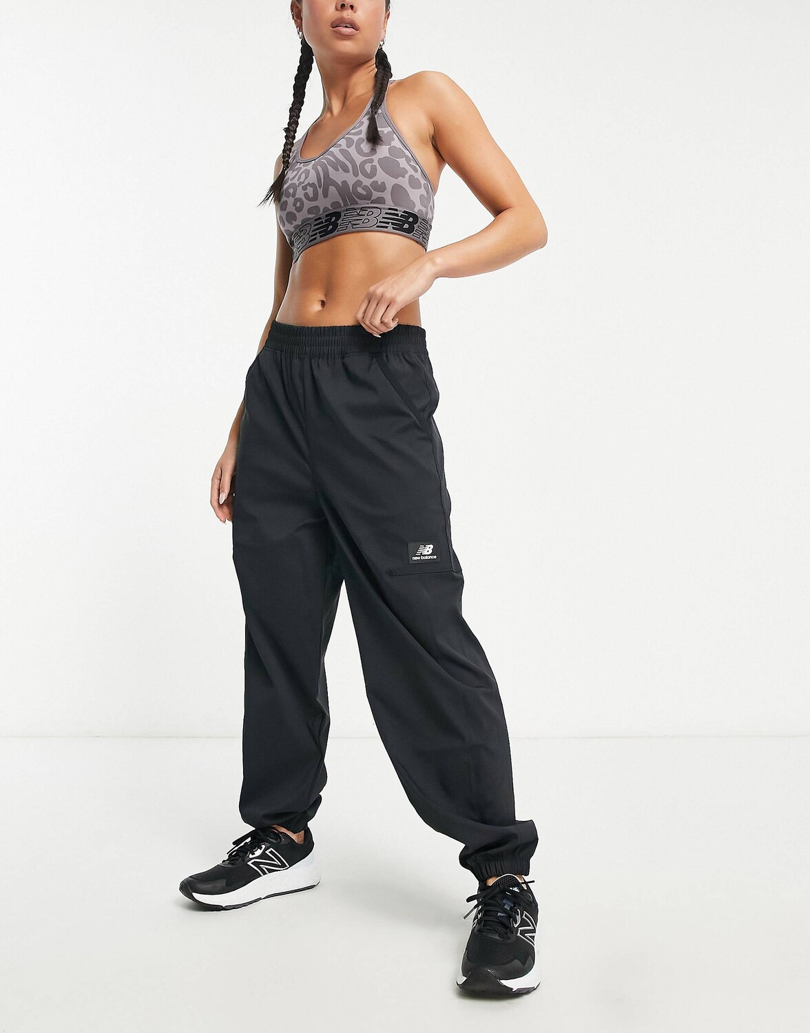 

Черные брюки New Balance All Terrain