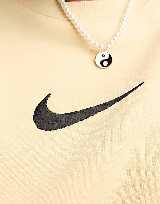 

Флисовый свитшот миди с галочкой Nike бледно-ванильного цвета
