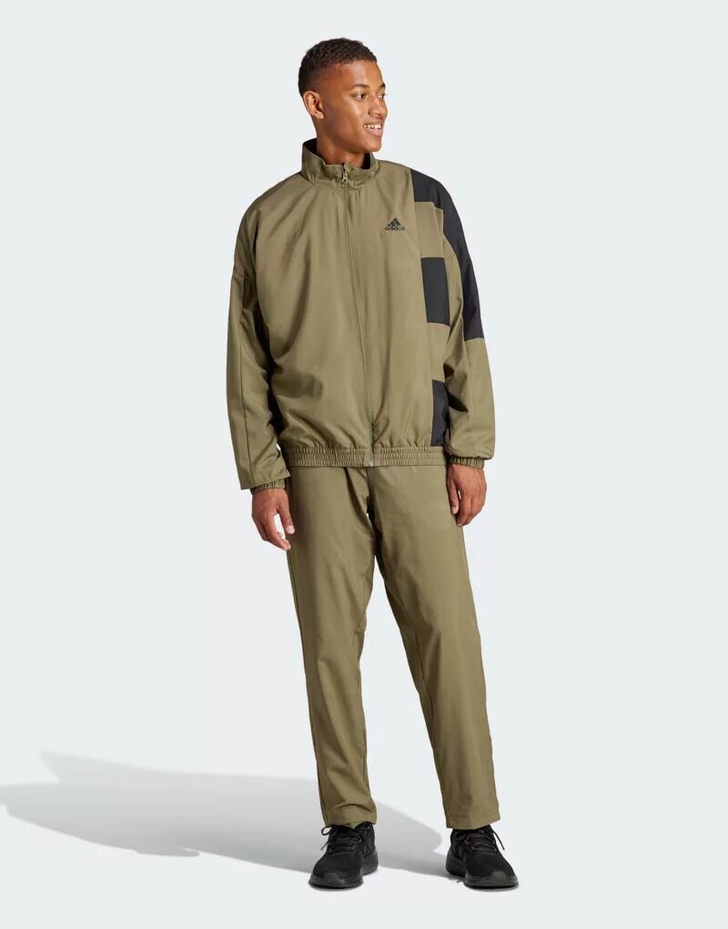 

Зеленый спортивный костюм adidas Sportswear с деталями колор-блоков adidas performance