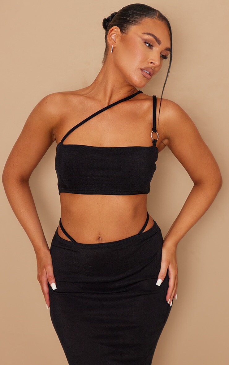 

PrettyLittleThing Черный бюстгальтер без косточек с обтягивающим уплотнительным кольцом и ремешками из ацетата