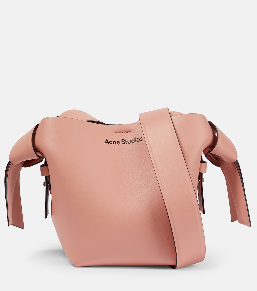 цена Кожаная мини-сумка через плечо Musubi Acne Studios, розовый