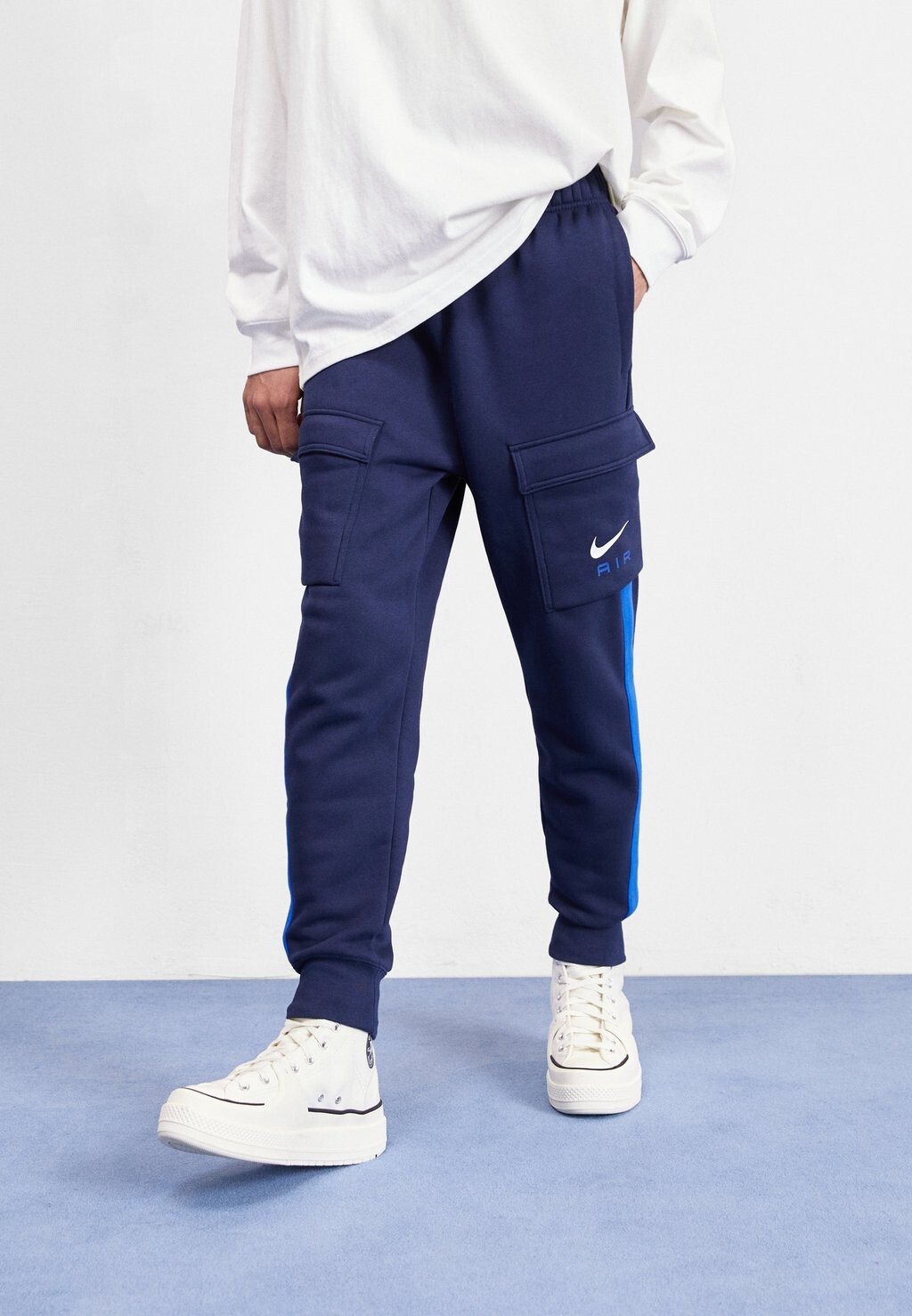 

Спортивные брюки AIR PANT Nike, обсидиан/королевская игра