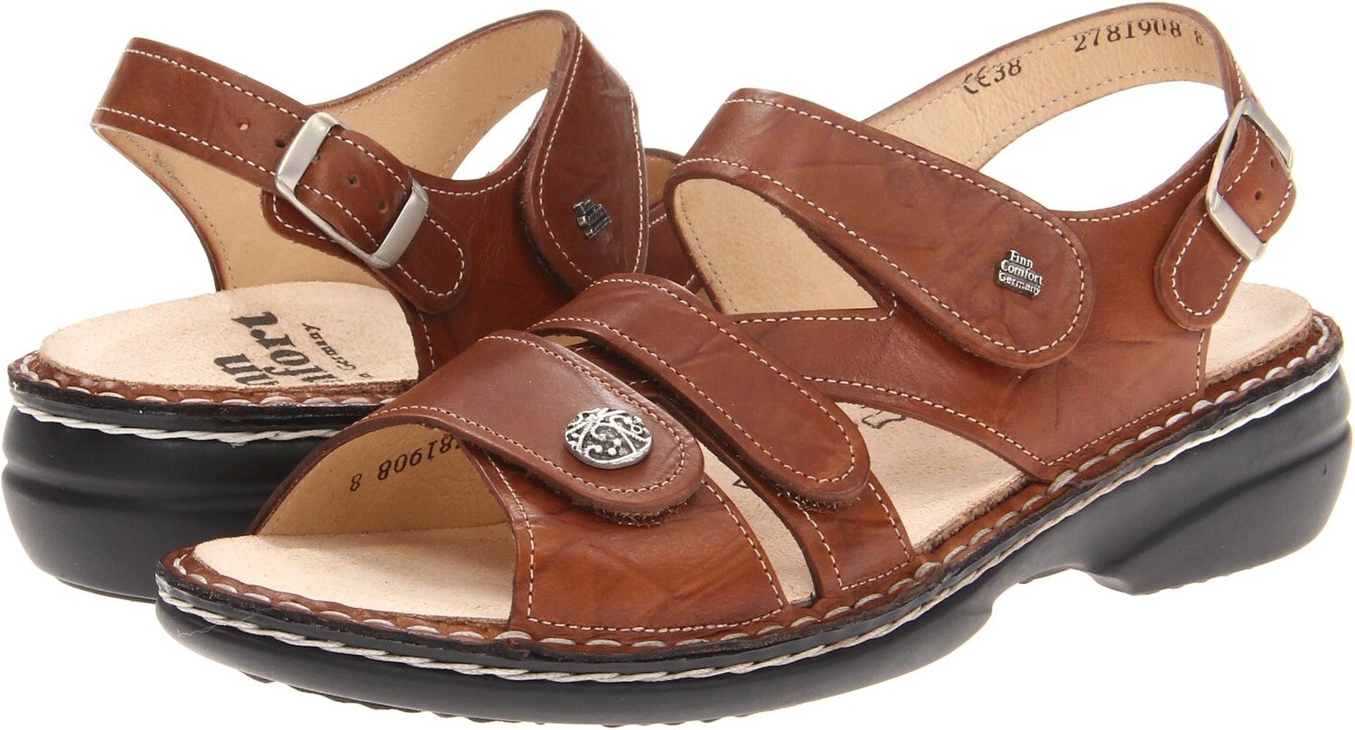 

Сандалии на плоской подошве Gomera - 82562 Finn Comfort, цвет Cognac