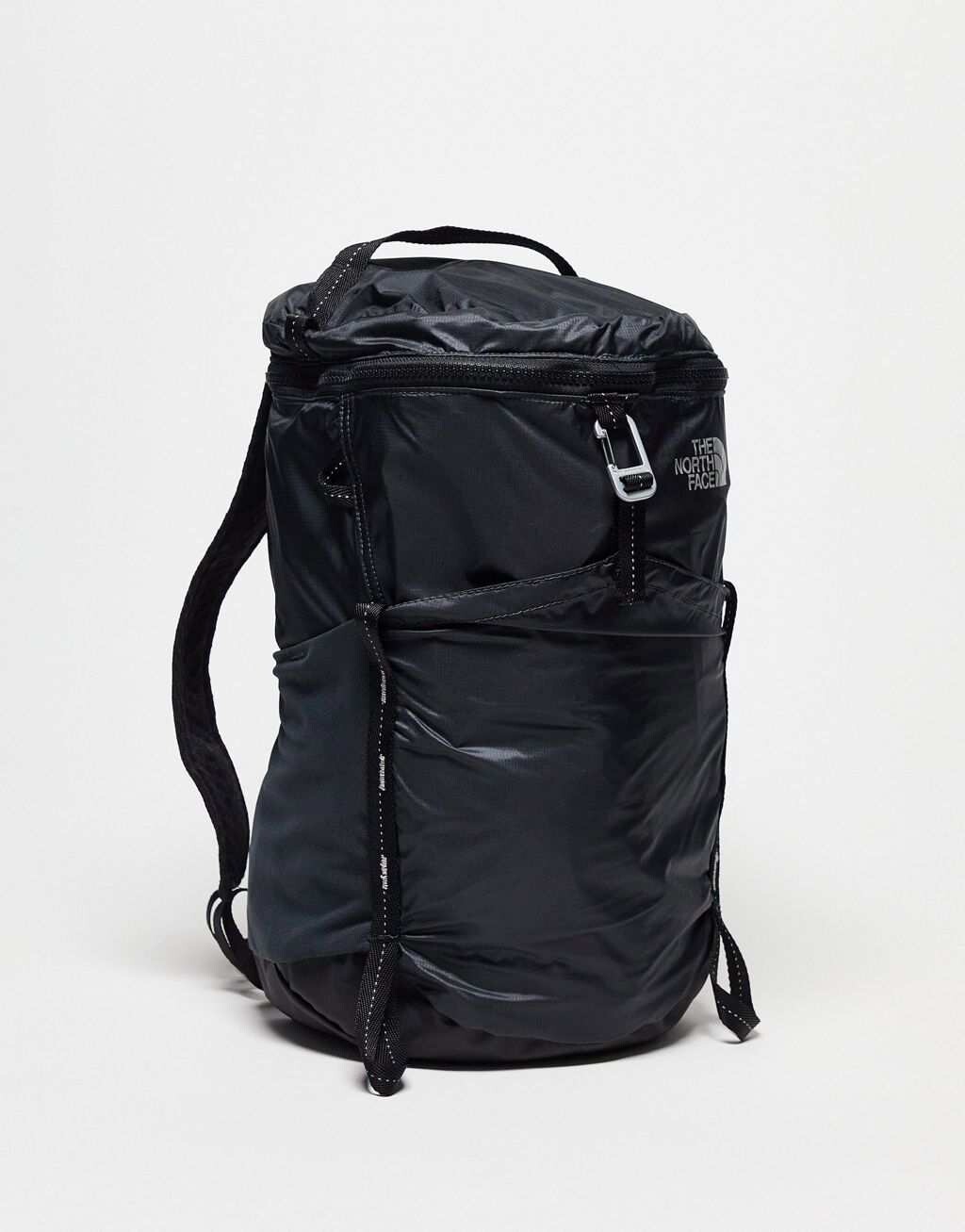 

Черный рюкзак The North Face Flyweight Daypack