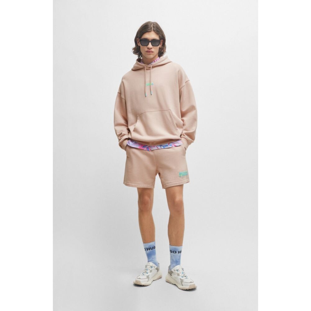 

Толстовка оверсайз из хлопковой махры с сезонными логотипами Hugo, цвет Light Pink
