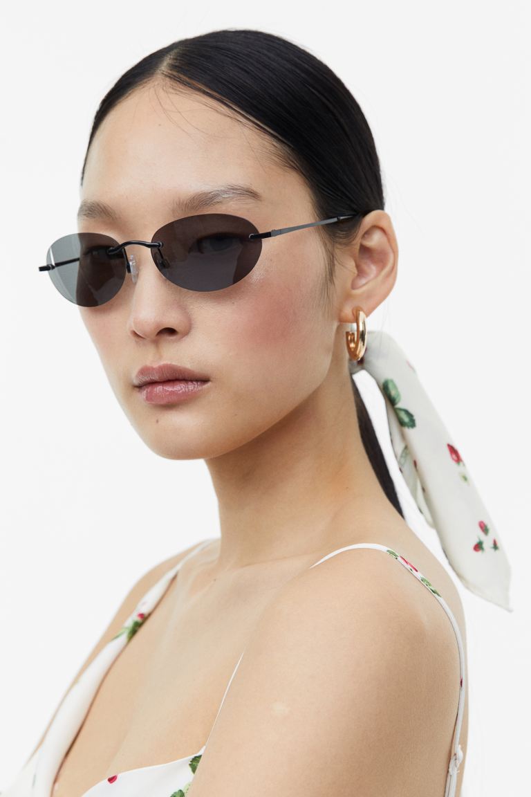 Овальные солнцезащитные очки без оправы H&M