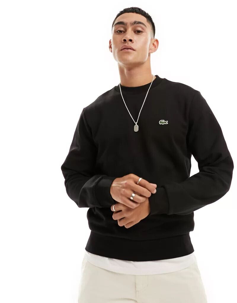 

Черная толстовка с логотипом Lacoste