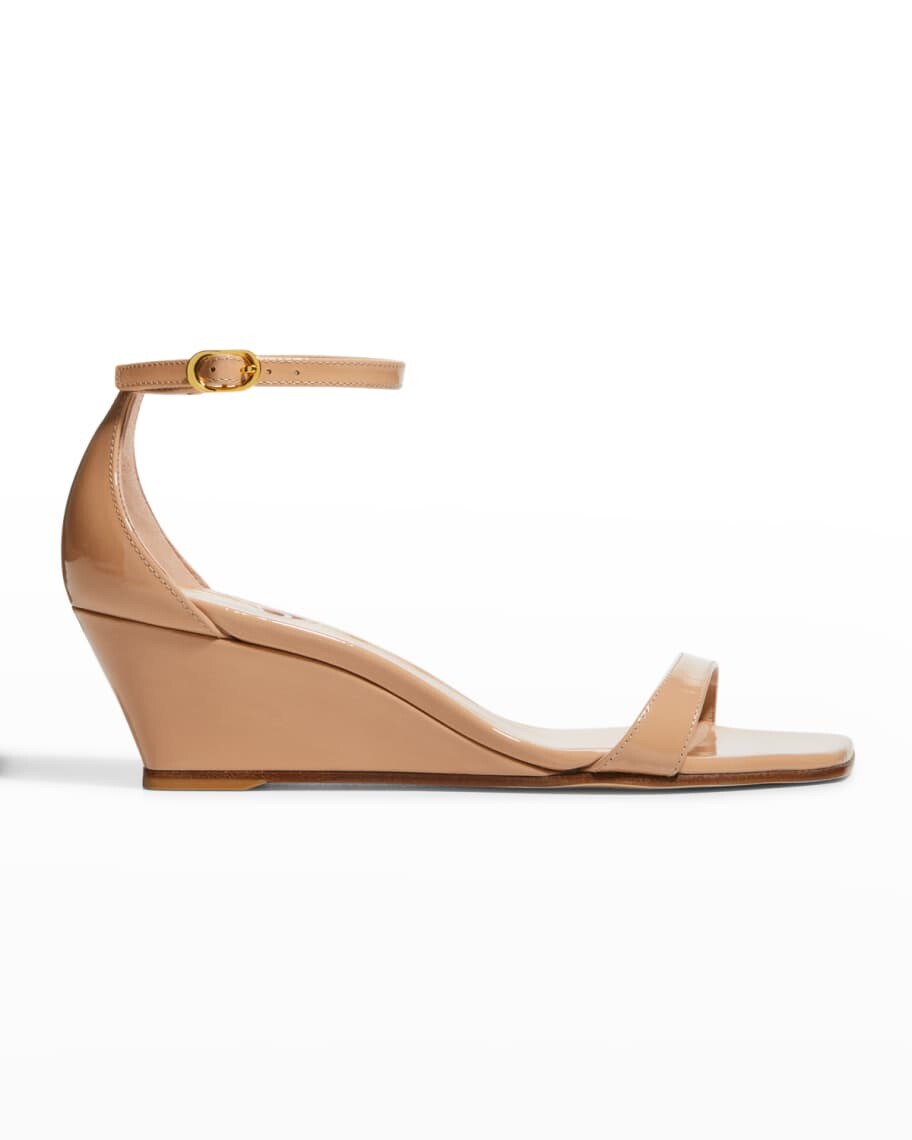 

Босоножки Nudistcurve из лакированной кожи на танкетке Stuart Weitzman