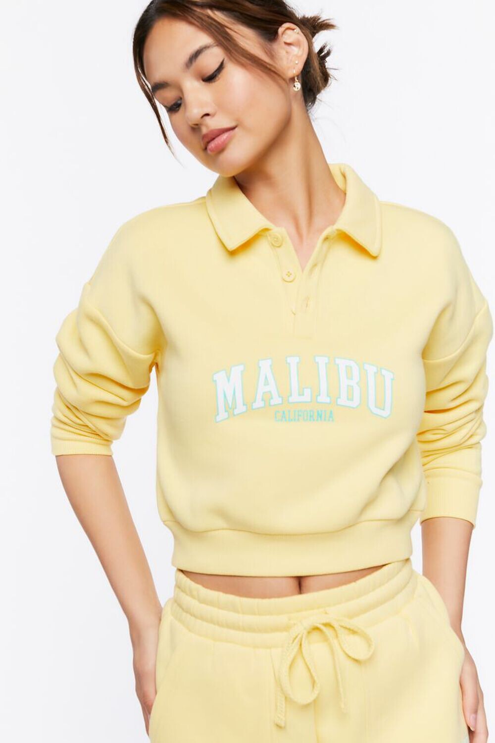 

Пуловер Malibu на полупуговицах с графическим рисунком Forever 21, желтый