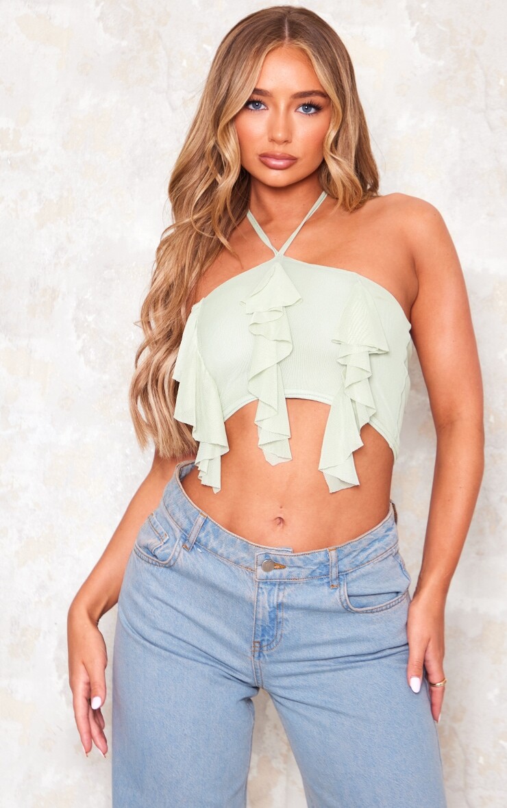 

PrettyLittleThing Пастельно-зеленый укороченный топ из сетчатой ​​ткани с воротником халтер и оборками