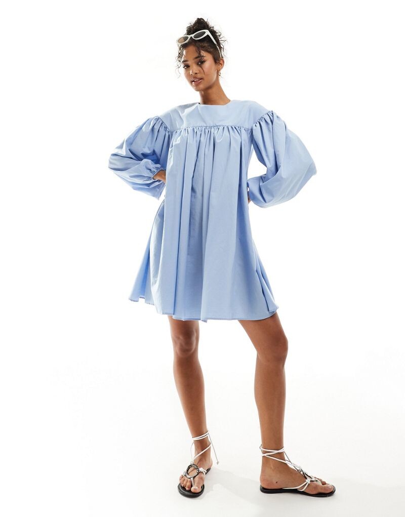 

Синее свободное платье мини с объемными рукавами и бантом на спине ASOS DESIGN