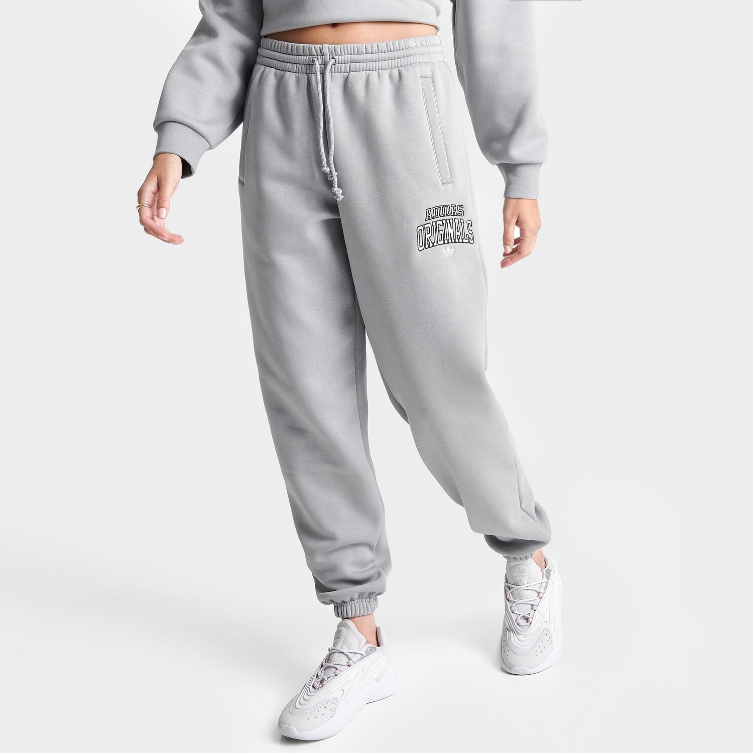 

Женские брюки для бега adidas Varsity Jogger, серый