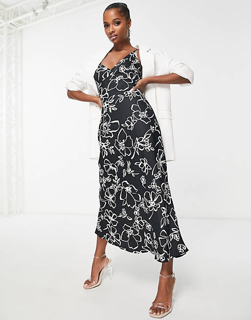 

Черное атласное платье-комбинация макси с высоким верхом ASOS DESIGN Petite с белым цветочным принтом, Черный