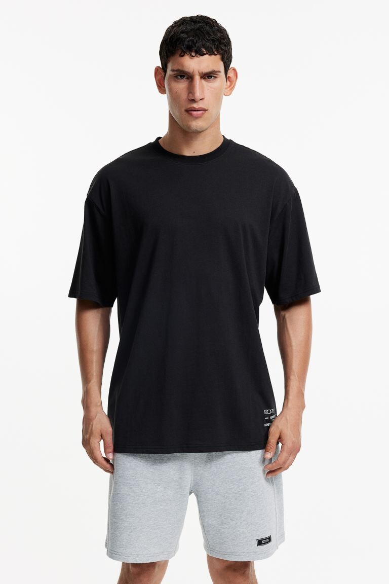 

Спортивная футболка с принтом DryMove H&M