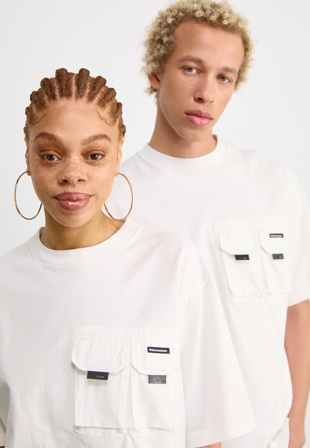 

Футболка с принтом Disarmed Tee Unisex Manastash, weiß