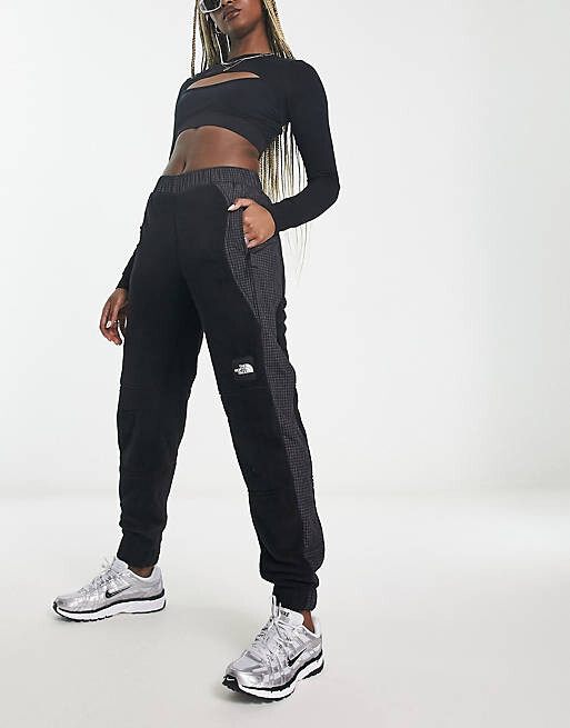 

Черные джоггеры из микрофлиса The North Face NSE Convin