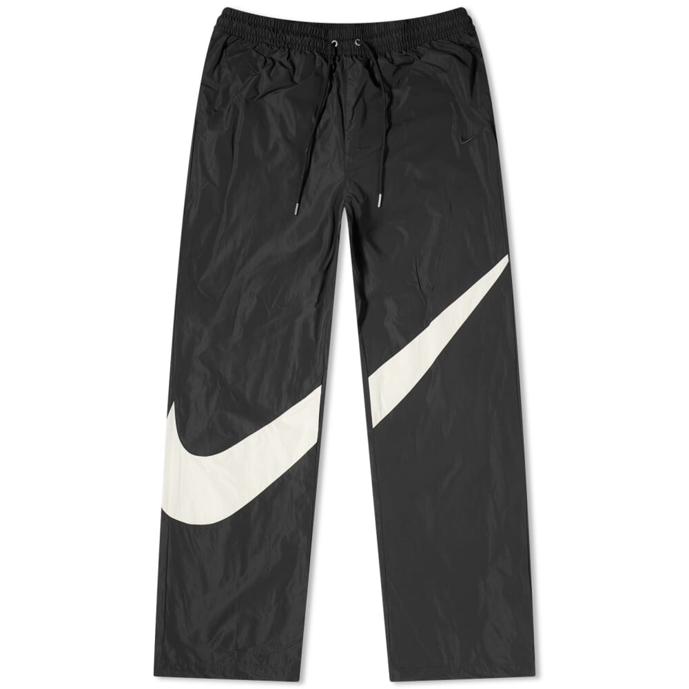 

Тканые брюки Nike с галочкой
