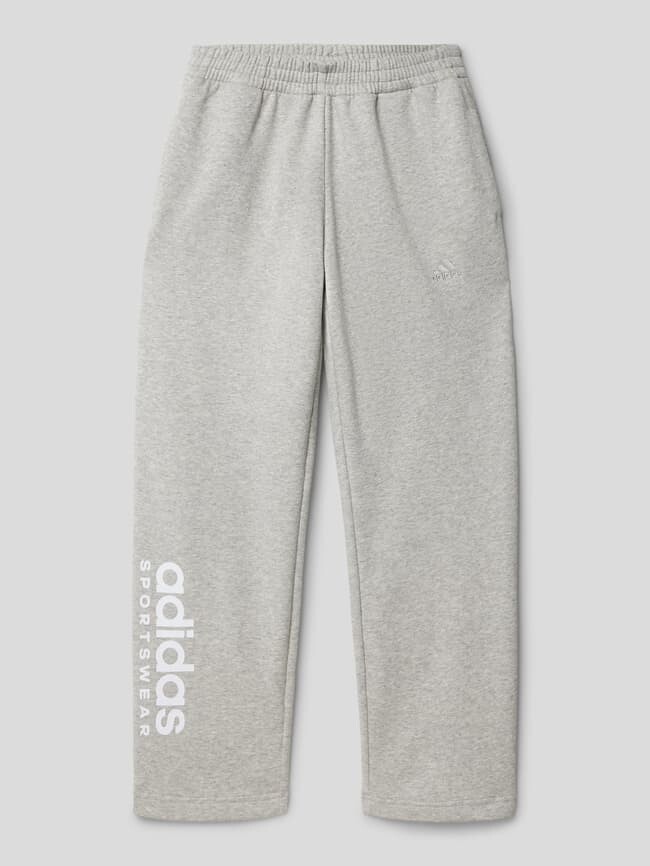 

Спортивные брюки с принтом этикеток ADIDAS SPORTSWEAR, серый