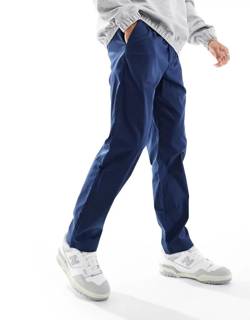 

Синие брюки прямого кроя из твила New Balance 30"