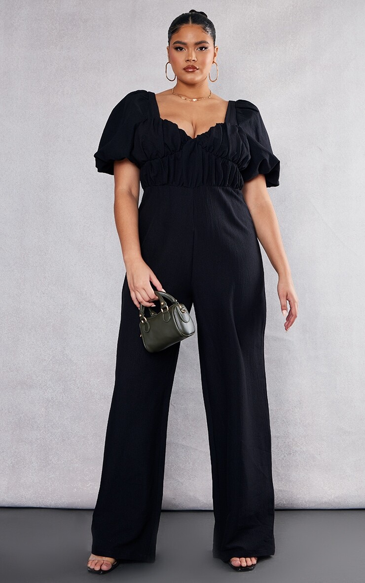 

PrettyLittleThing Черный фактурный комбинезон Plus с пышными рукавами