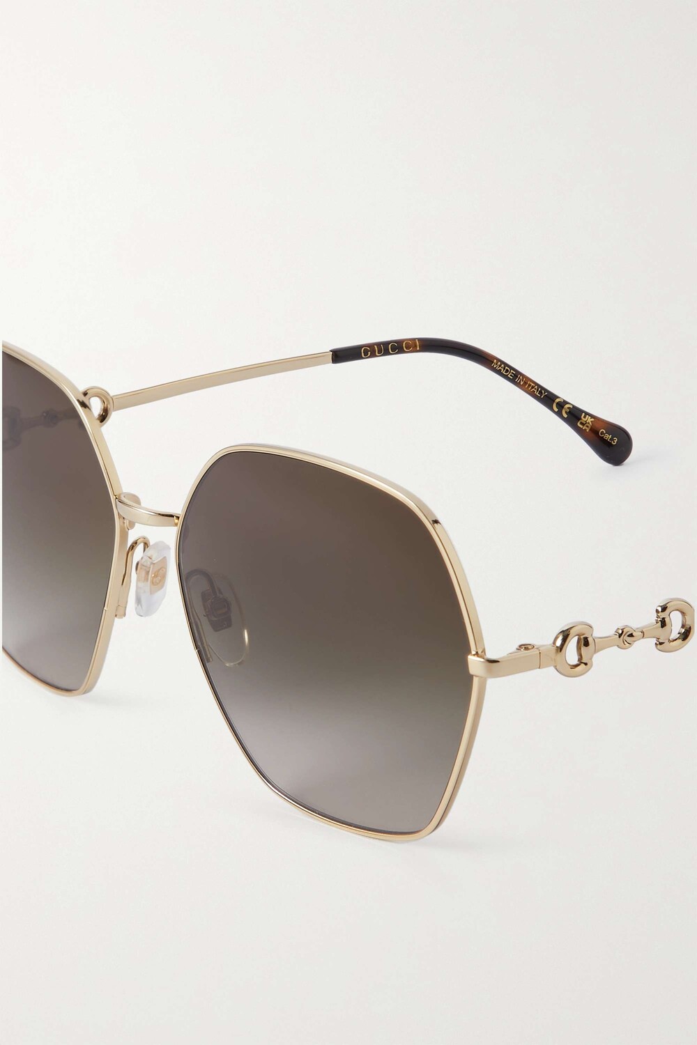 

GUCCI EYEWEAR солнцезащитные очки GG Horsebit в металлической оправе золотистого цвета с D-образной оправой, золото