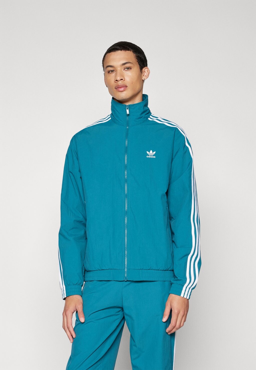 

Тренировочная куртка adidas Originals, темно-бирюзовый цвет