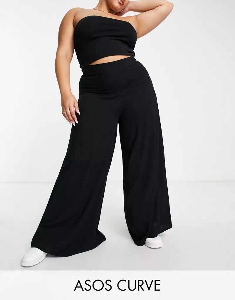 

Черные трикотажные брюки-палаццо ASOS DESIGN Curve