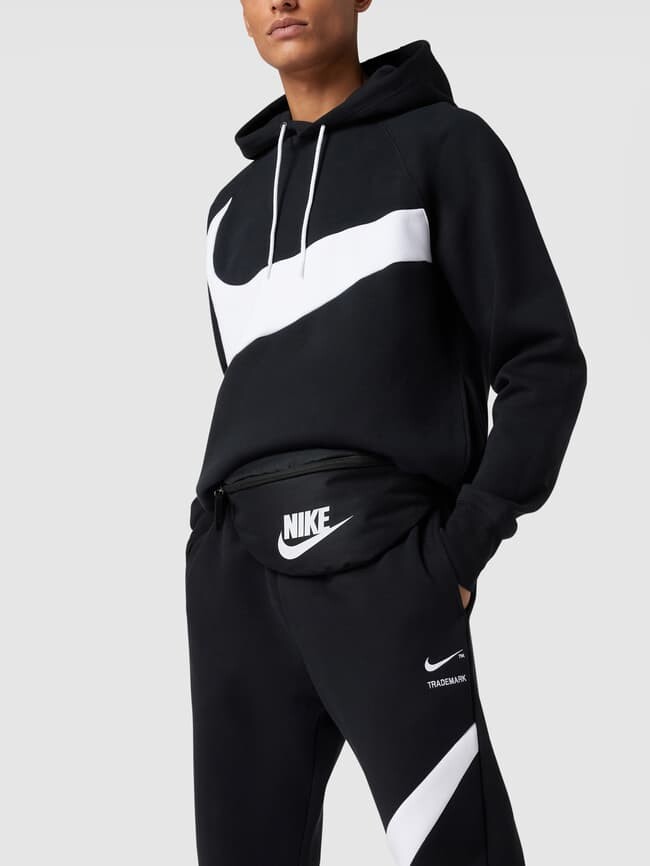 

Поясная сумка с принтом этикетки Nike, черный