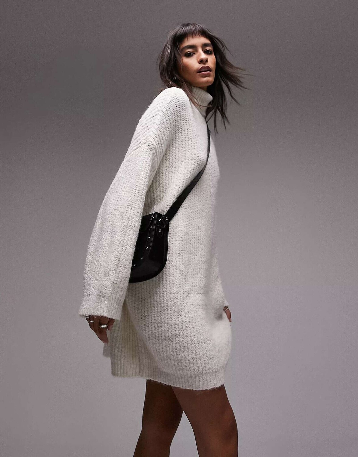 

Вязаное мини-платье цвета слоновой кости с высоким воротником Topshop