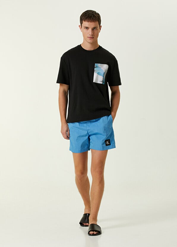 

Синий купальник с логотипом Calvin Klein