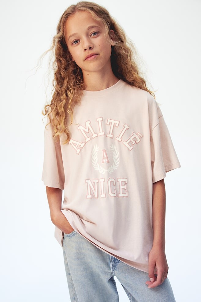

Футболка оверсайз с принтом H&M, розовый