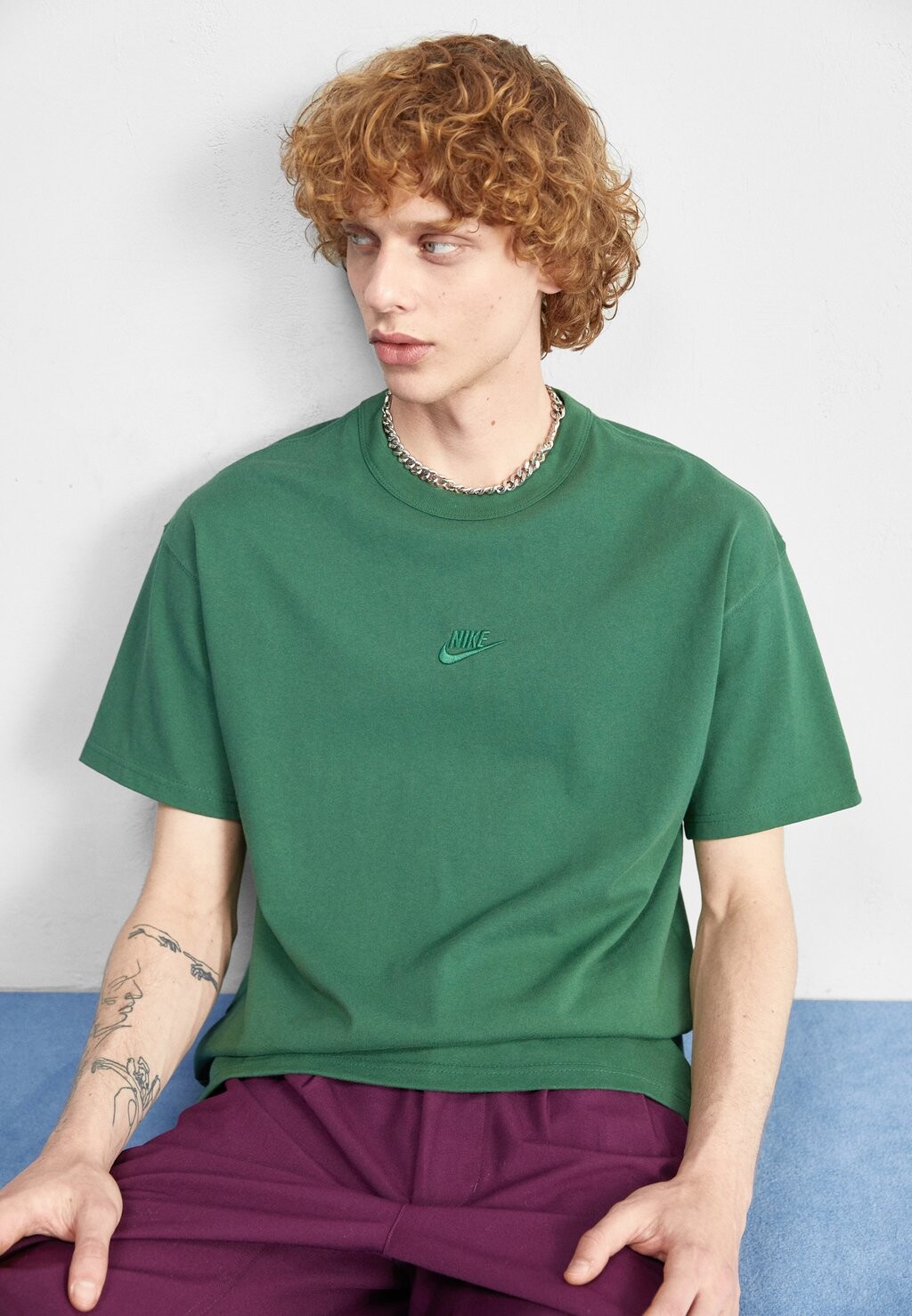 

Базовая футболка Nike, ель