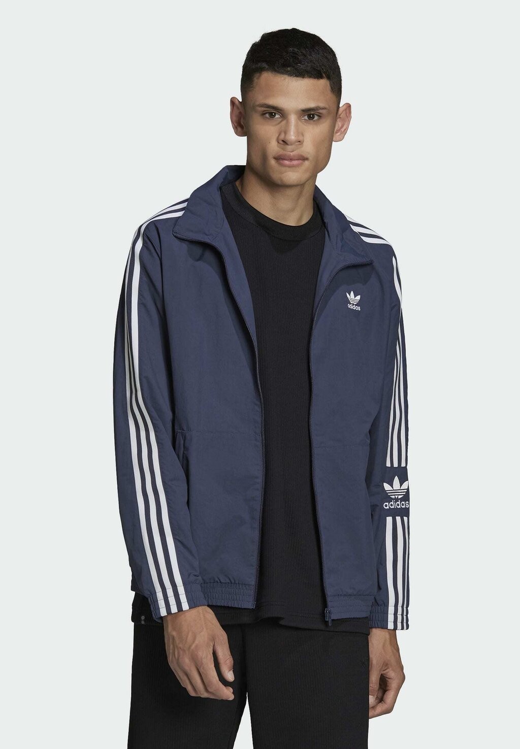 

Спортивная куртка adidas Originals, синий