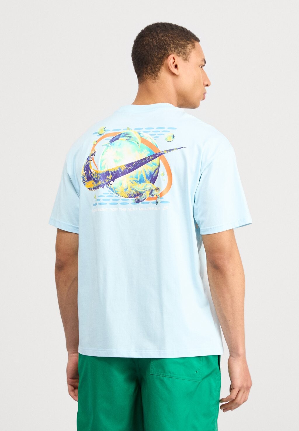 

Футболка с принтом Tee M90 Graphic Nike, ледниково-синий