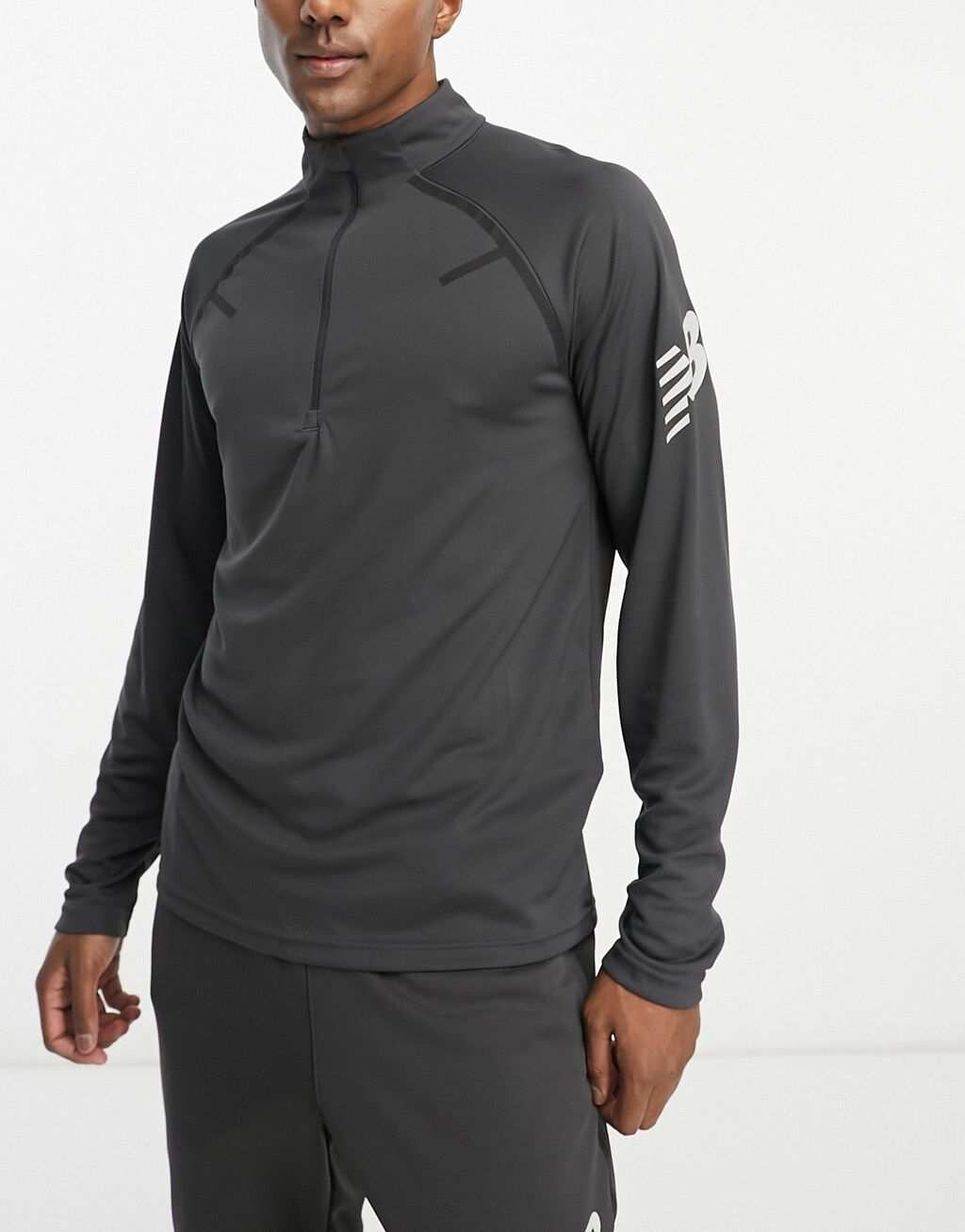 

Черные кроссовки с молнией 1/4 New Balance Tenacity Football Training