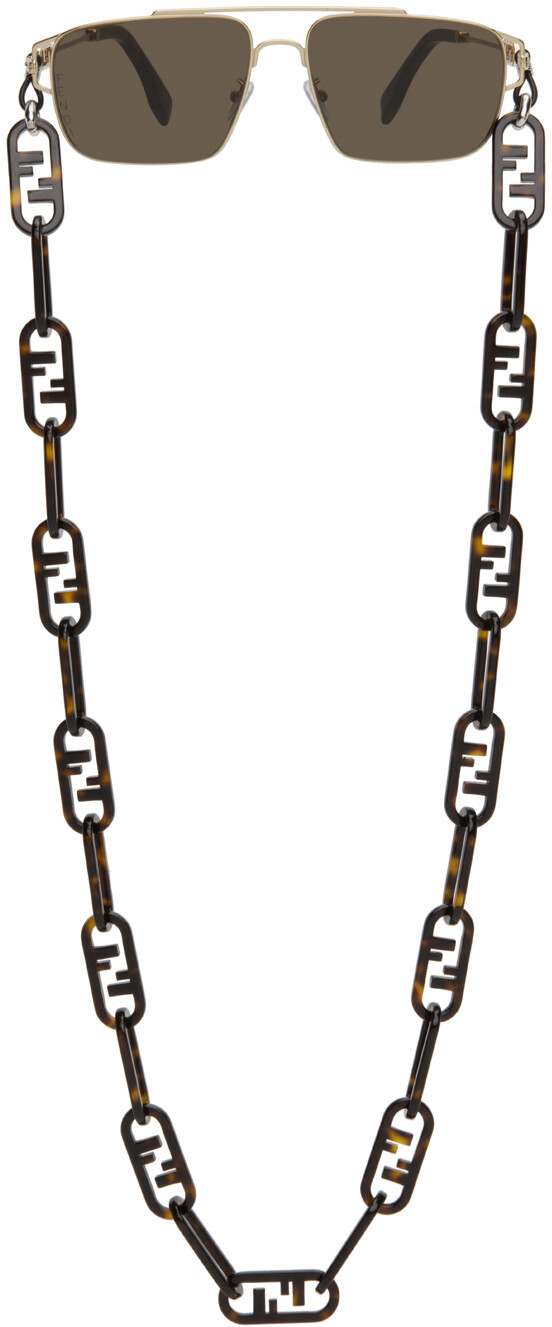 

Золотые солнцезащитные очки OLock Fendi
