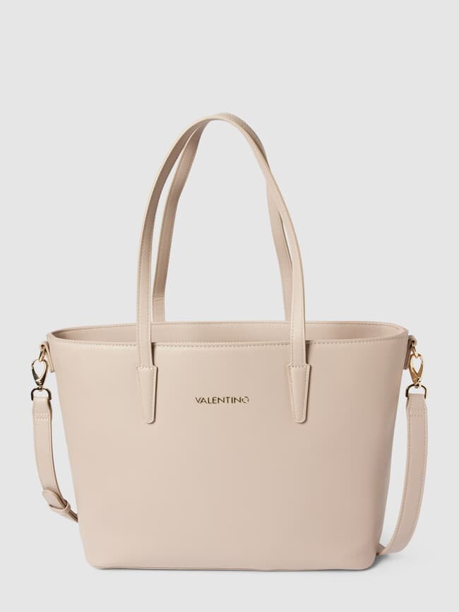 

Модель покупателя с этикеткой ZERO Valentino, бежевый