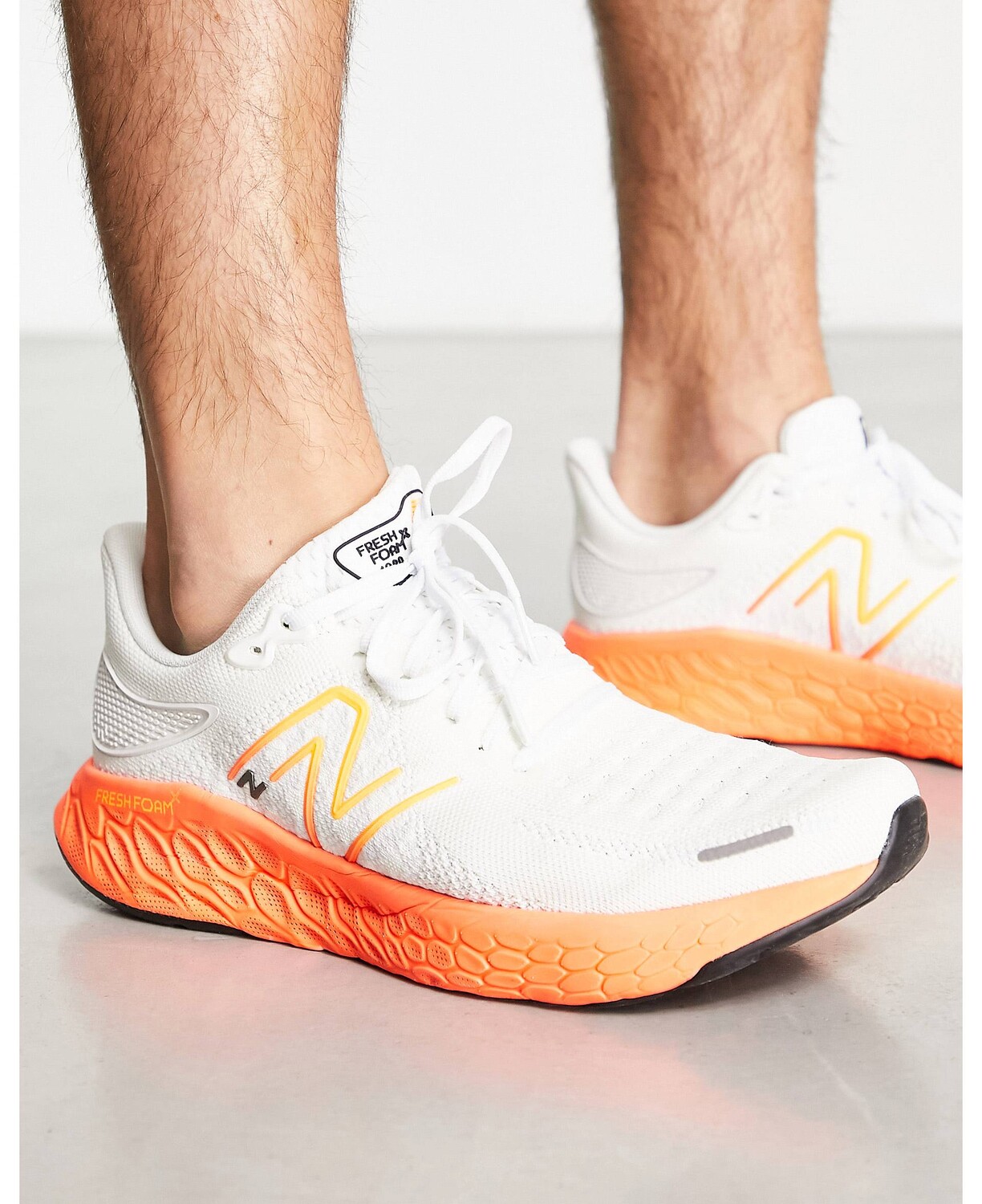 

Бело-оранжевые кроссовки New Balance Running 1080