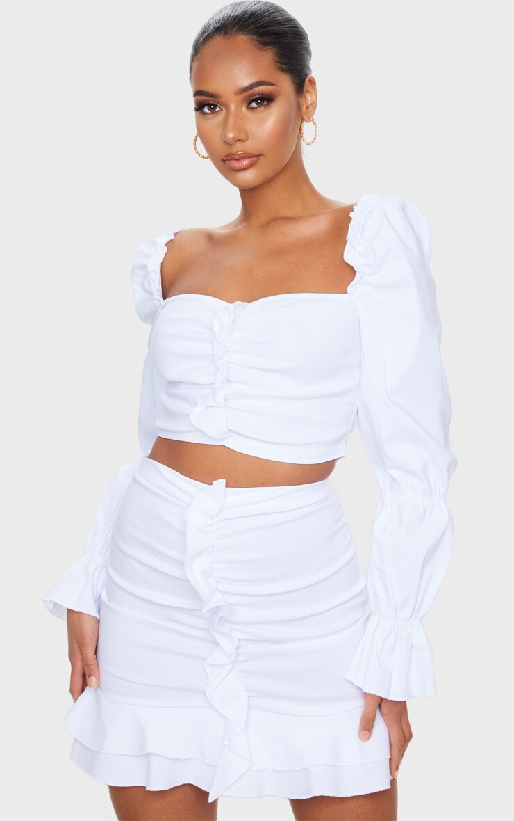 

PrettyLittleThing Белая мини-юбка со сборками спереди из эластичной жабо