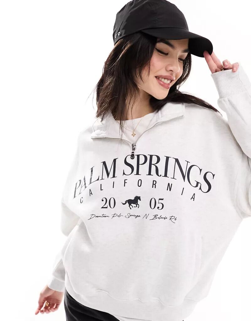 

Серая толстовка на молнии с половиной молнии Bershka с принтом Palm Springs