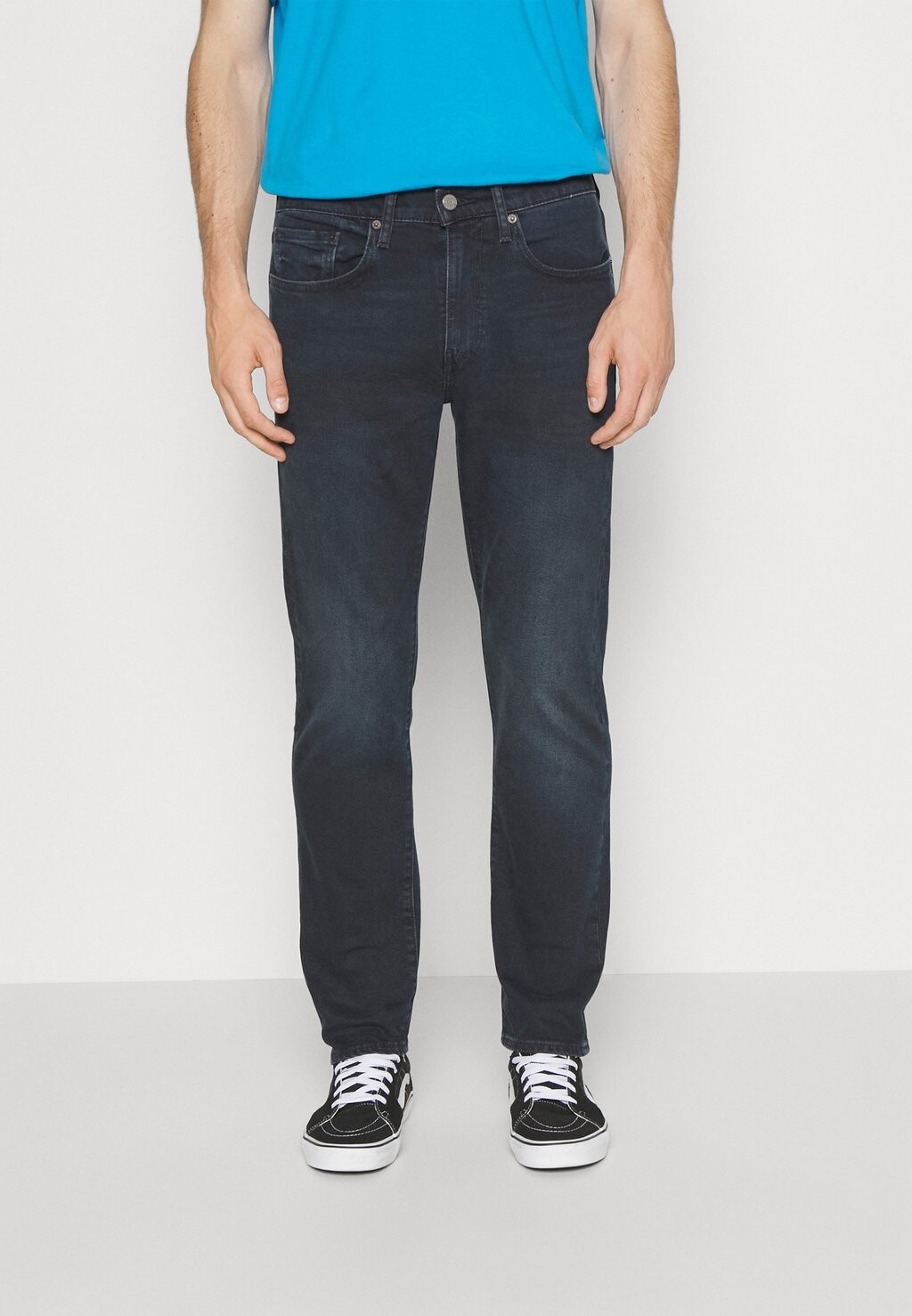 

Джинсы свободного кроя Levi's 502 Taper, темно–синий сто