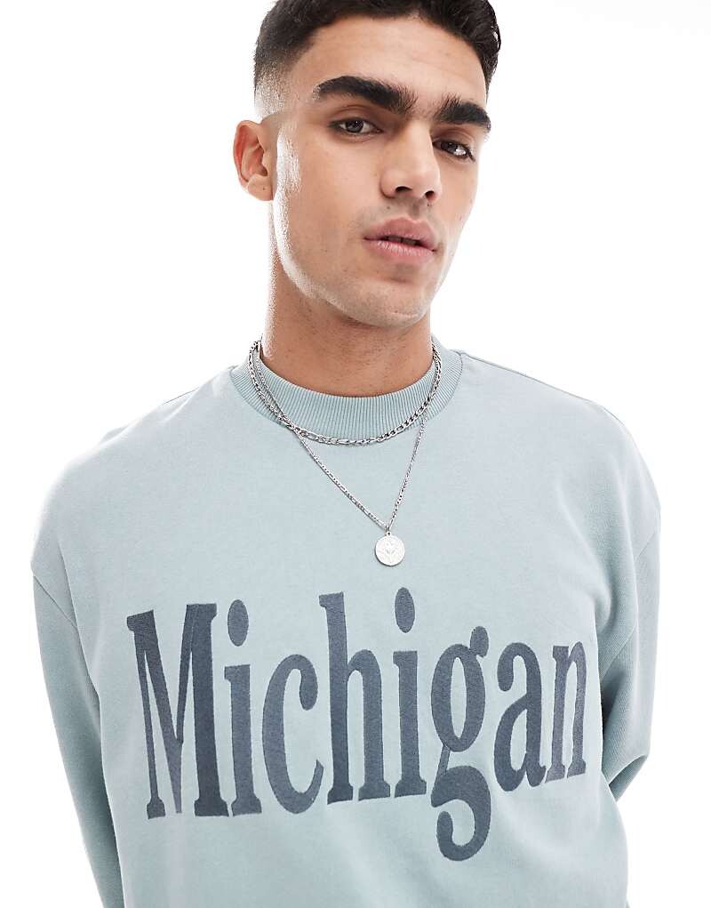 

ASOS DESIGN – толстовка оверсайз размытого синего цвета с текстовым принтом